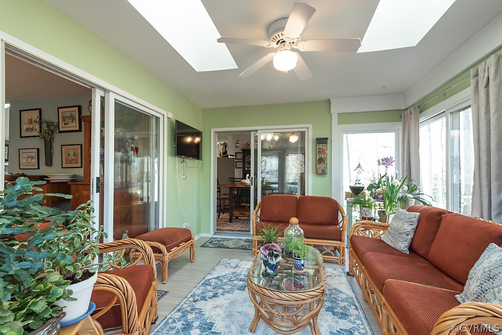 4708 Twin Cedars Road Chester, VA 23831 - Photo 30 of 38 a living room with furniture and a potted plant