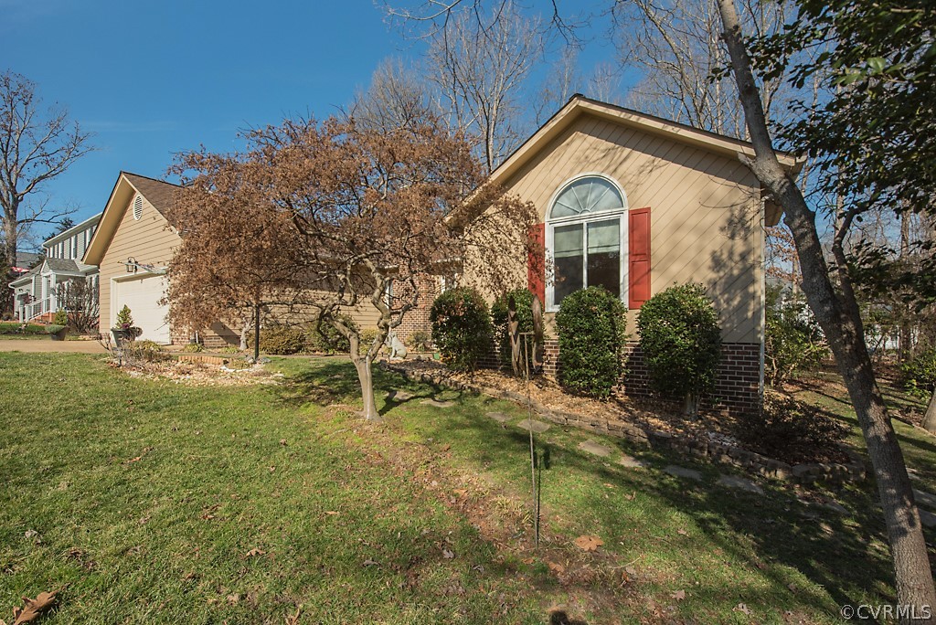 4708 Twin Cedars Road Chester, VA 23831 - Photo 3 of 38 a house view with a outdoor space