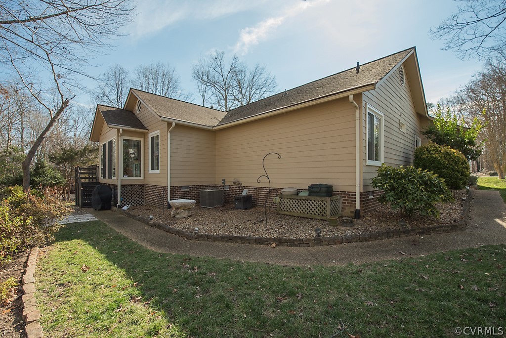 4708 Twin Cedars Road Chester, VA 23831 - Photo 32 of 38 a view of a house with a yard