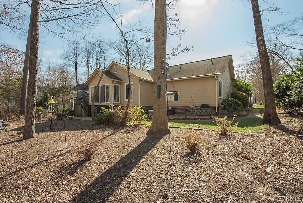 4708 Twin Cedars Road Chester, VA 23831 - Photo 33 of 38 a front view of a house with a yard
