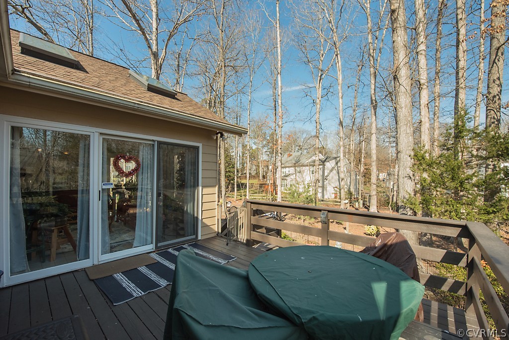 4708 Twin Cedars Road Chester, VA 23831 - Photo 38 of 38 a view of a balcony with chairs and a potted plant