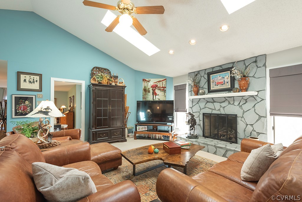 4708 Twin Cedars Road Chester, VA 23831 - Photo 8 of 38 a living room with furniture a fireplace and a flat screen tv