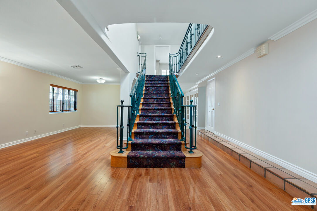 3290 Malcolm Avenue Los Angeles, CA 90034 - Photo 11 of 58 a view of entryway and hall with wooden floor