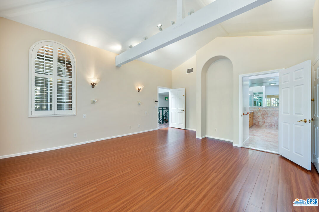 3290 Malcolm Avenue Los Angeles, CA 90034 - Photo 36 of 58 wooden floor in an empty room with a window
