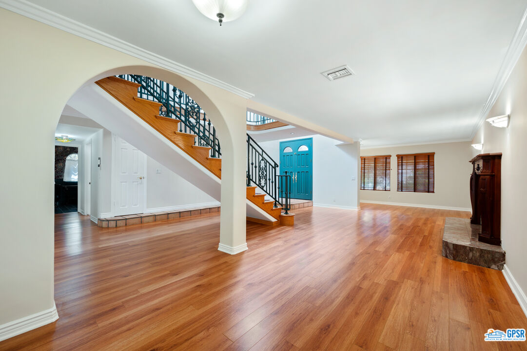 3290 Malcolm Avenue Los Angeles, CA 90034 - Photo 8 of 58 a view of an entryway with wooden floor