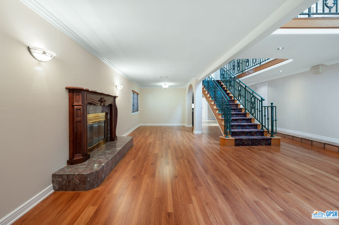 3290 Malcolm Avenue Los Angeles, CA 90034 - Photo 9 of 58 a view of entryway with wooden floor