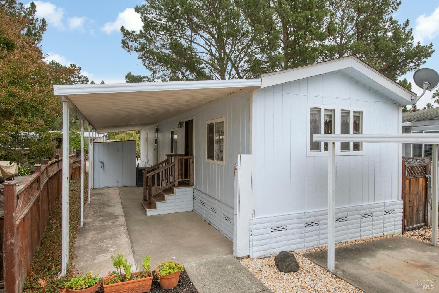 223 Pomo Way Sonoma, CA 95476 - Photo 1 of 1 a patio with table and chairs
