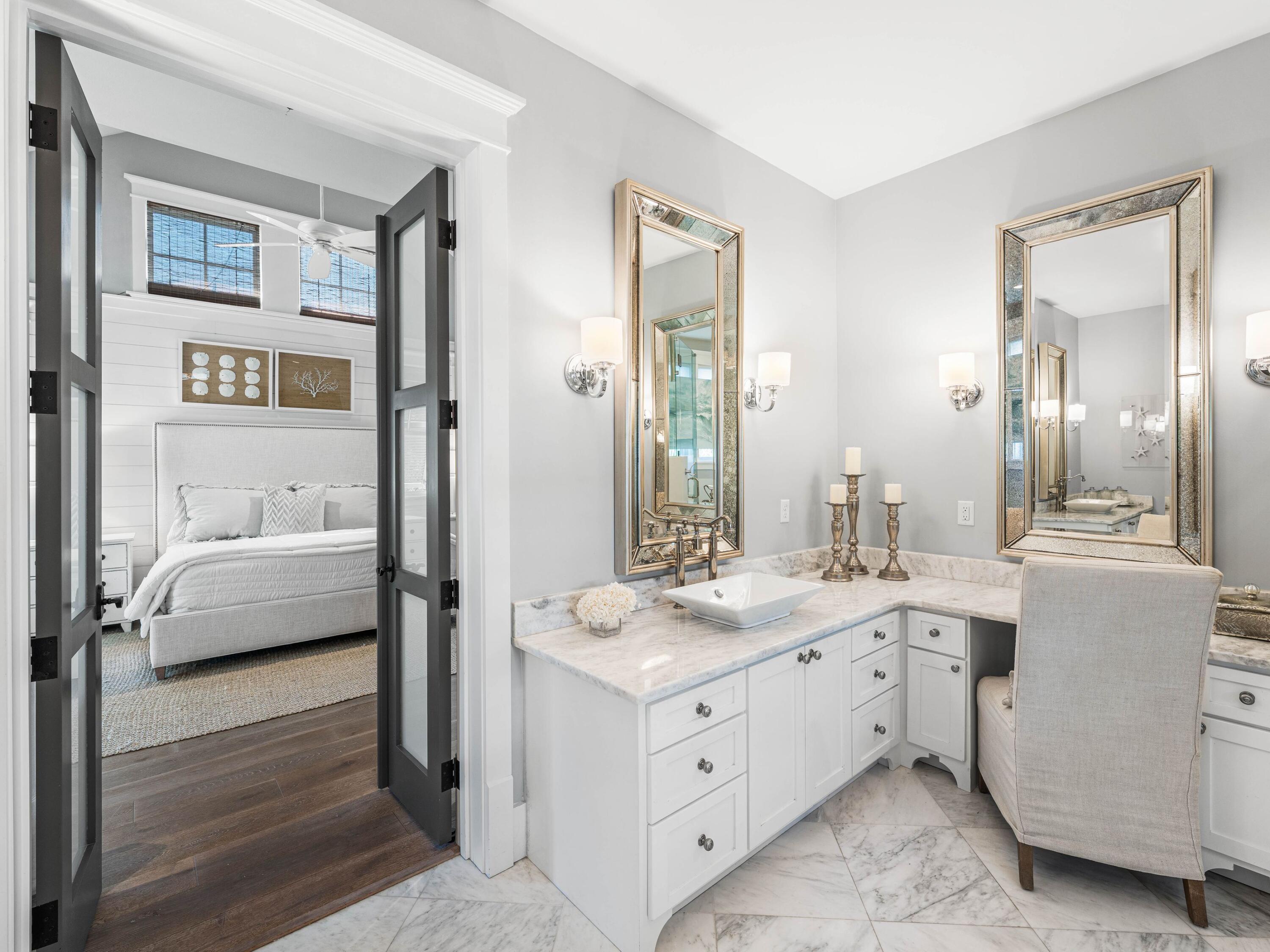 52 North Shingle Lane Watersound, FL 32461 - Photo 17 of 66 a en suite bathroom with a double vanity sink a mirror and a bathtub