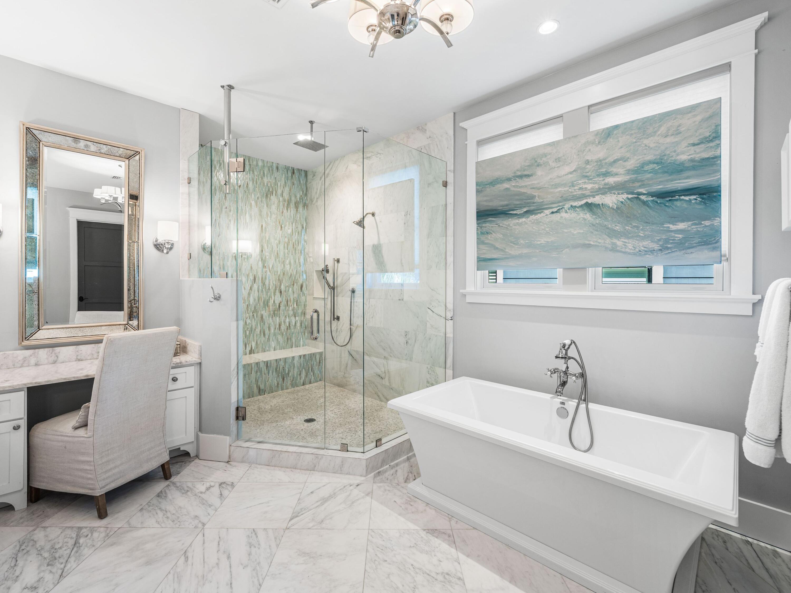 52 North Shingle Lane Watersound, FL 32461 - Photo 18 of 66 a bathroom with a tub a sink and a large mirror