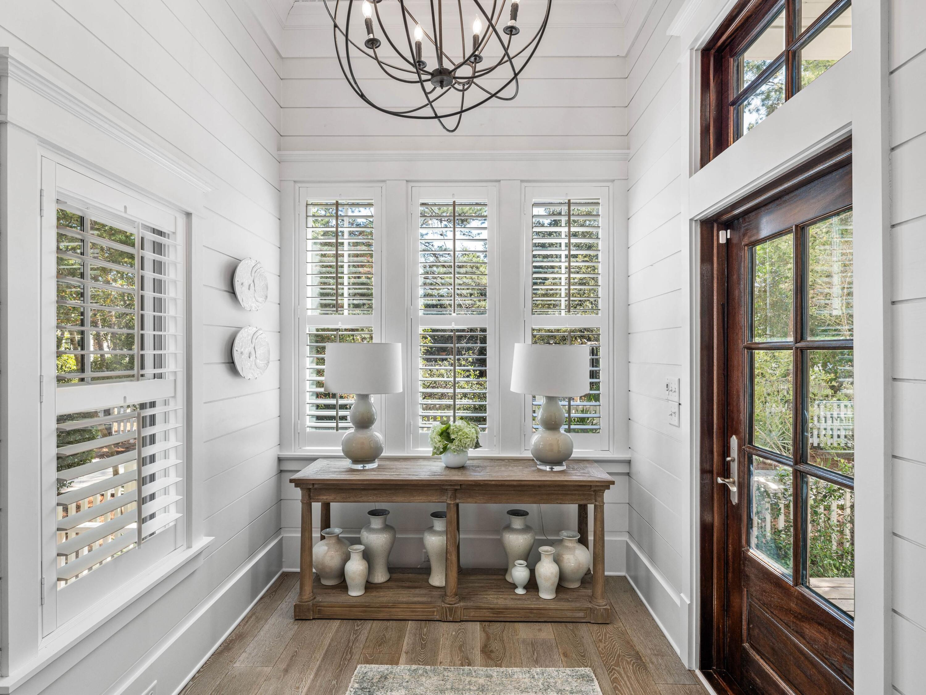 52 North Shingle Lane Watersound, FL 32461 - Photo 30 of 66 a view of a room with a large window and furniture