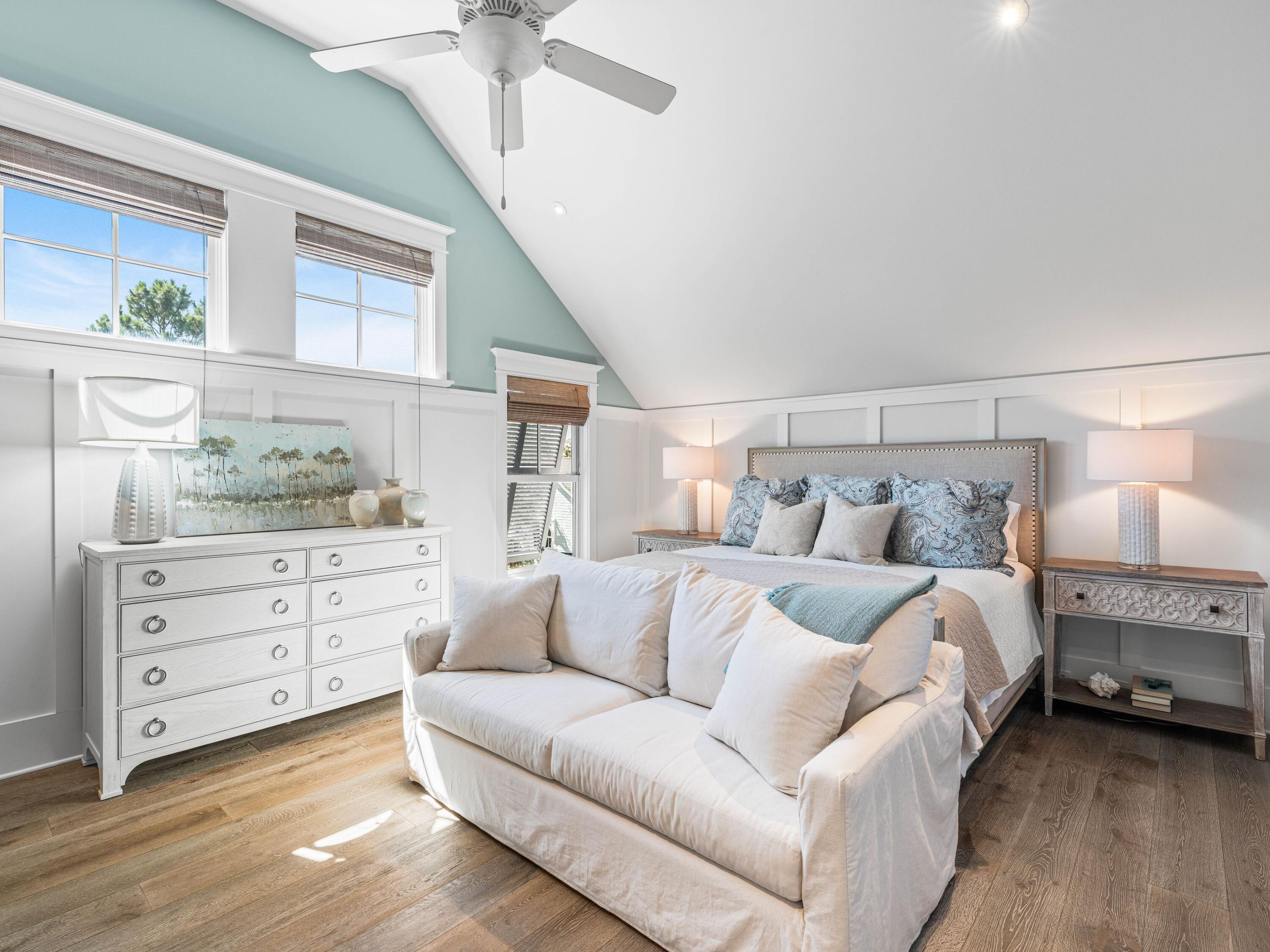 52 North Shingle Lane Watersound, FL 32461 - Photo 36 of 66 a spacious bedroom with a bed and a window