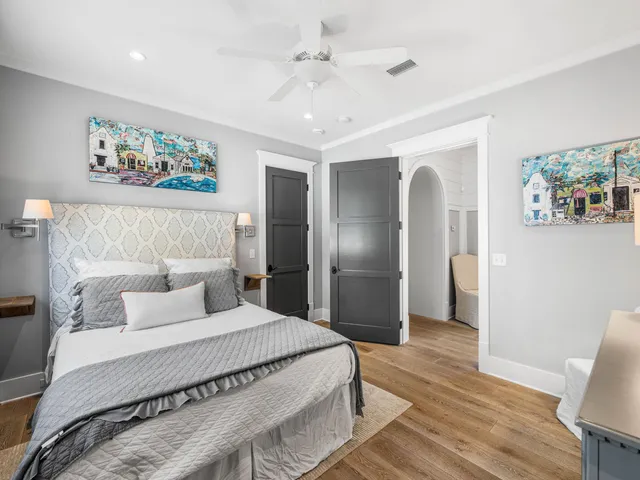 an aerial view of residential building with outdoor space and trees