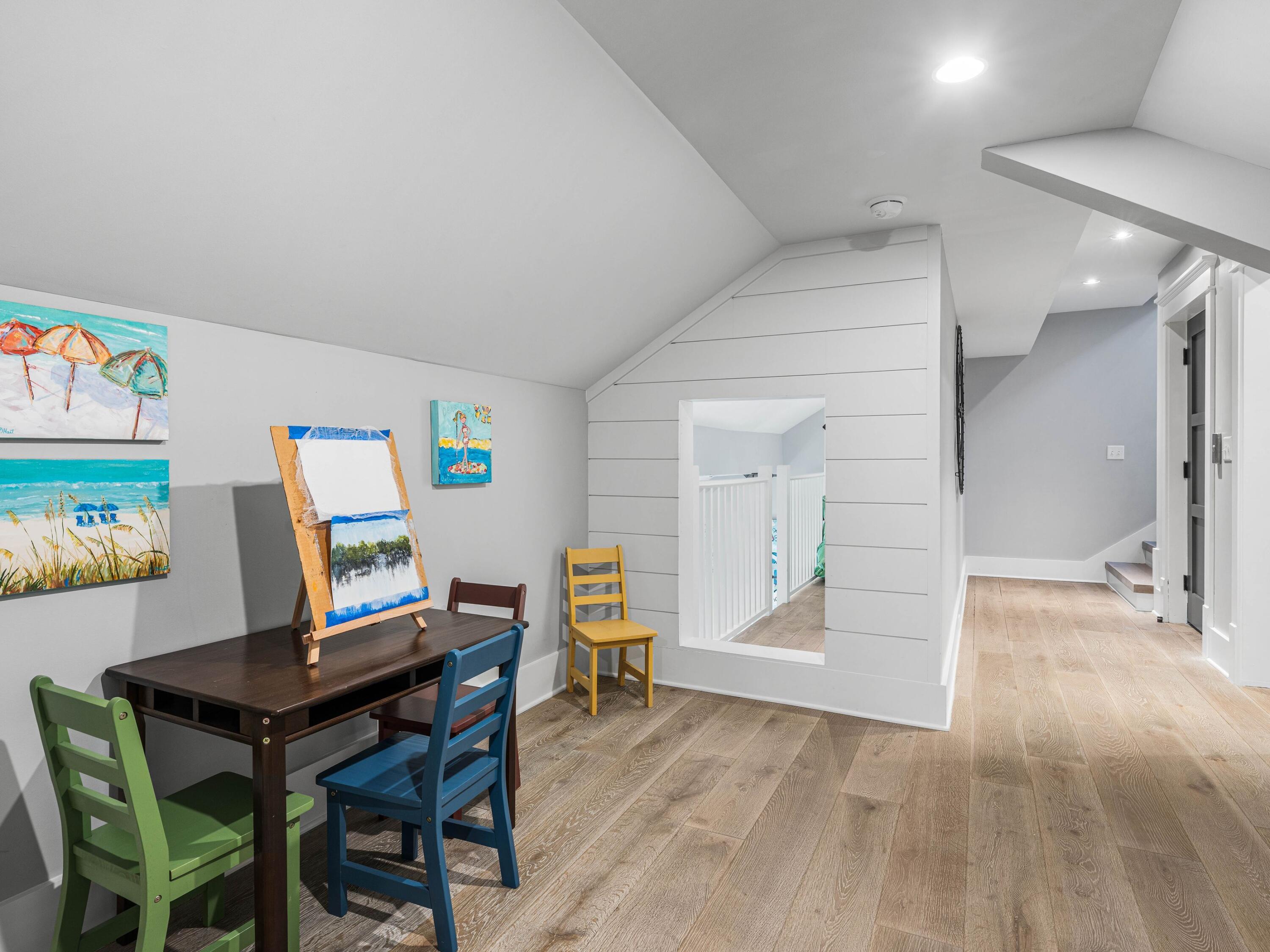 52 North Shingle Lane Watersound, FL 32461 - Photo 52 of 66 a workspace with furniture and wooden floor