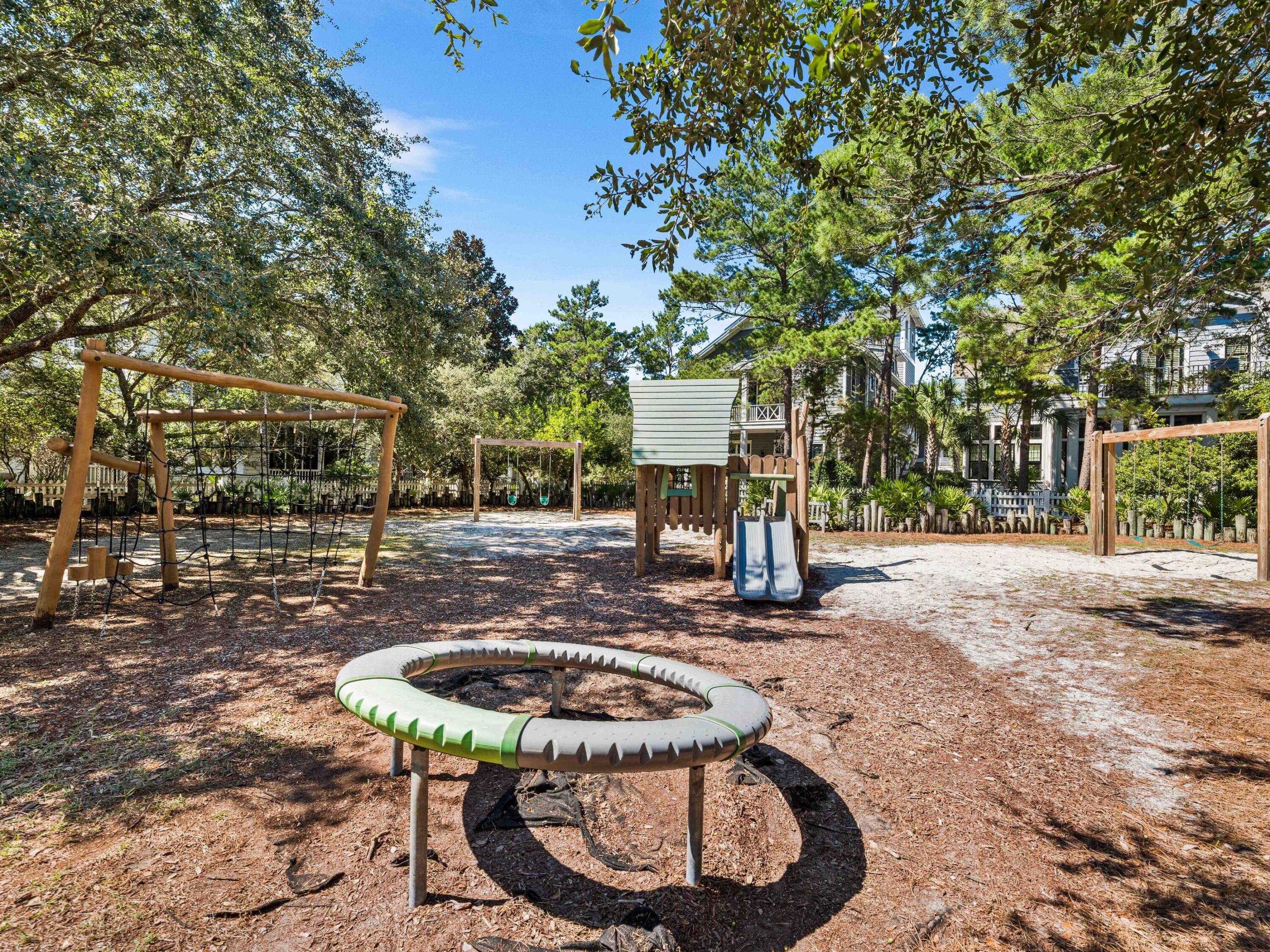 52 North Shingle Lane Watersound, FL 32461 - Photo 65 of 66 a view of a chairs and fire pit in the patio