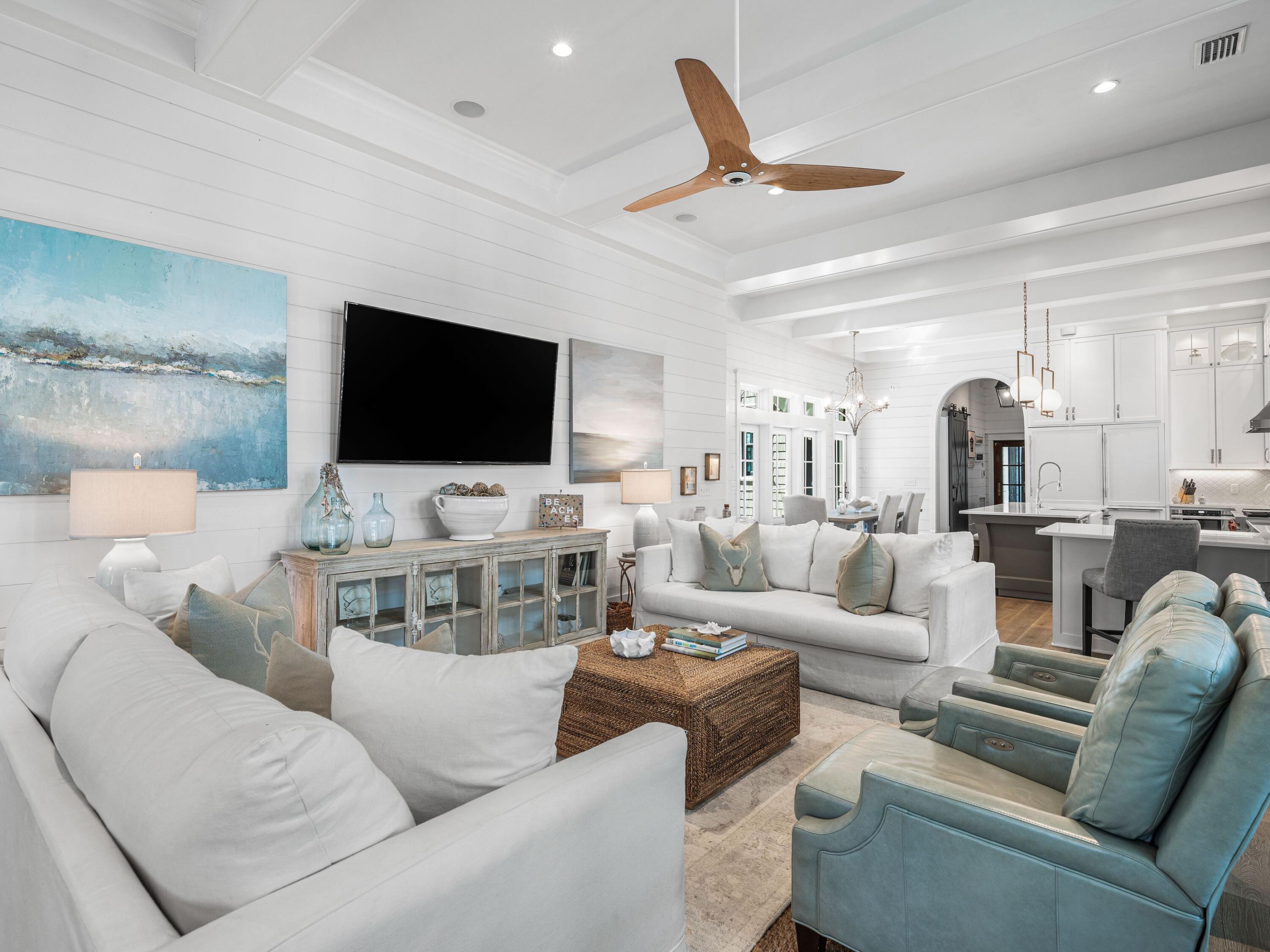 52 North Shingle Lane Watersound, FL 32461 - Photo 7 of 66 a living room with furniture and a flat screen tv