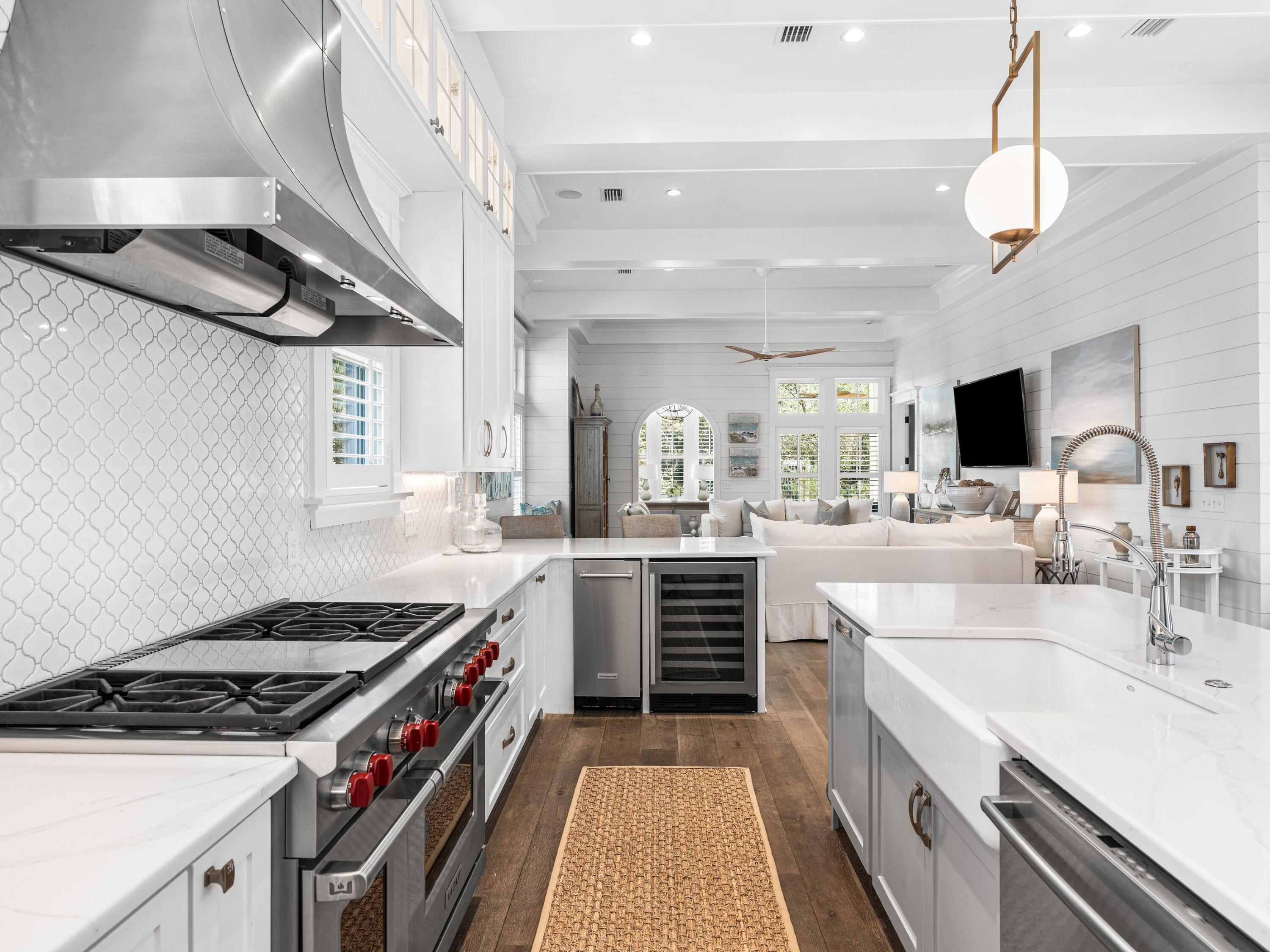 52 North Shingle Lane Watersound, FL 32461 - Photo 9 of 66 a kitchen with a stove and a sink