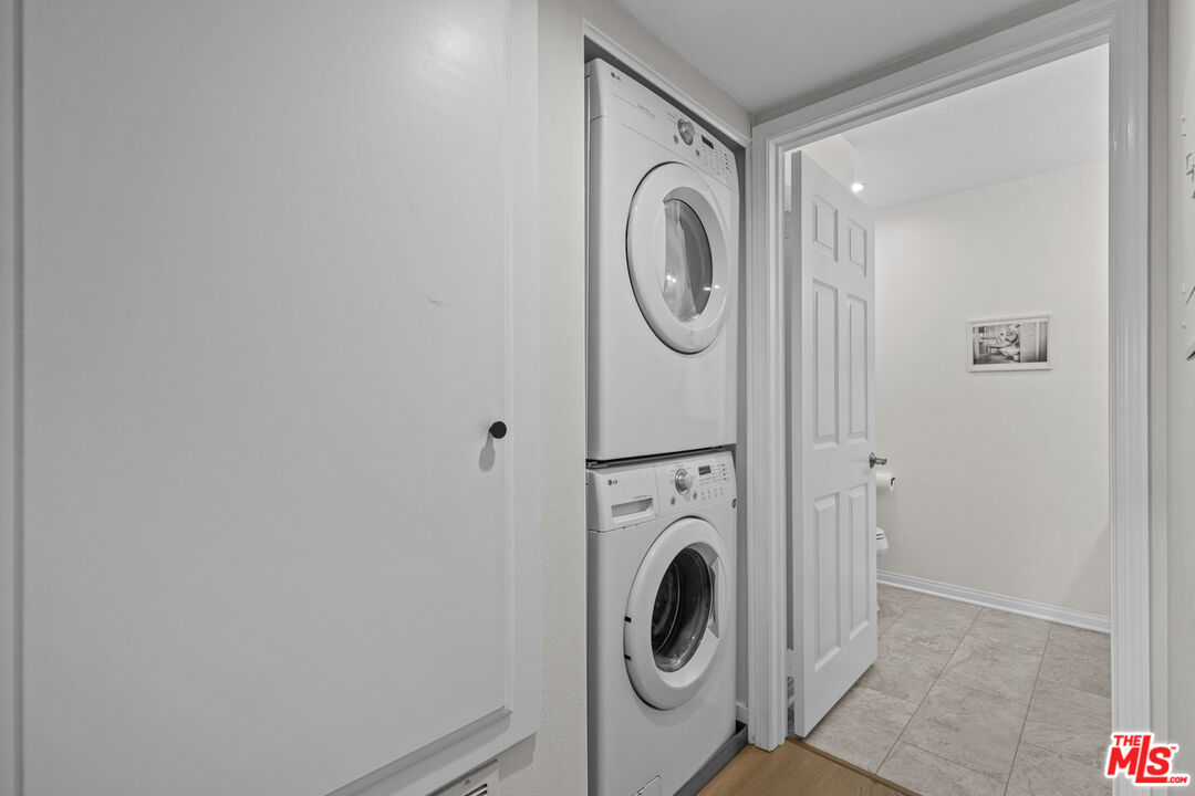 8601 Falmouth Avenue, Unit 404 Playa del Rey, CA 90293 - Photo 15 of 28 a utility room with dryer and washer