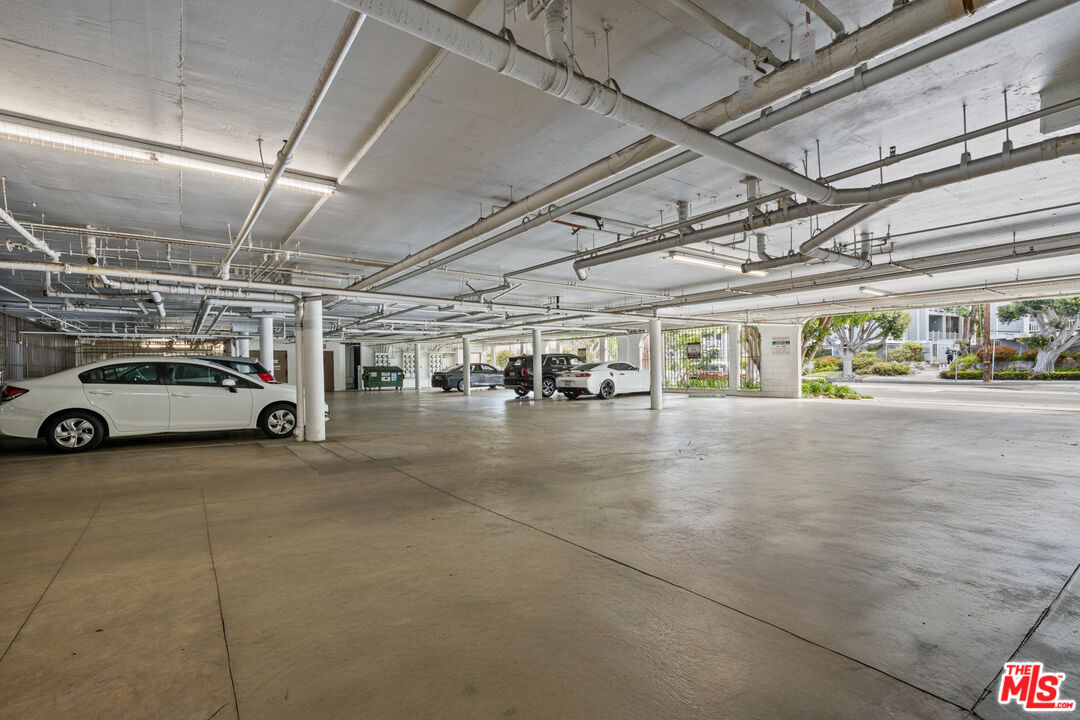 8601 Falmouth Avenue, Unit 404 Playa del Rey, CA 90293 - Photo 20 of 28 a view of parking garage with cars