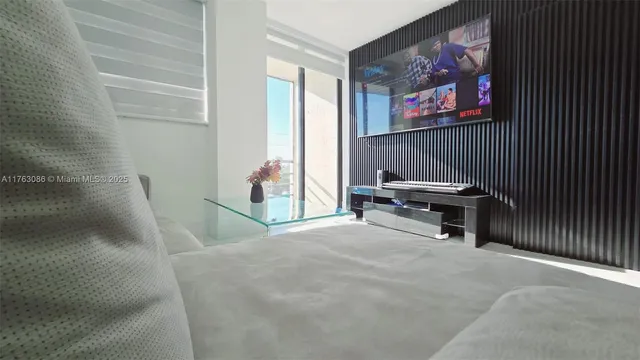 a kitchen with stainless steel appliances a refrigerator stove and microwave