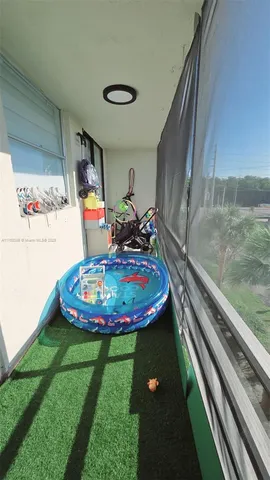 a room with a table and chairs