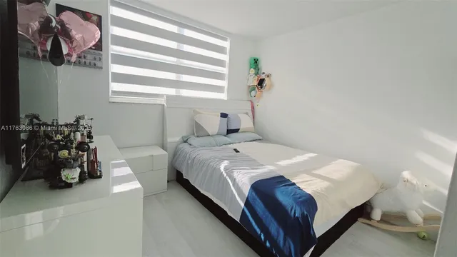 a room with lots of different colored cloths