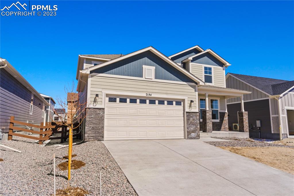 2154 Coyote Mint Drive Monument, CO 80132 - Photo 3 of 46 a view of a house with a outdoor space