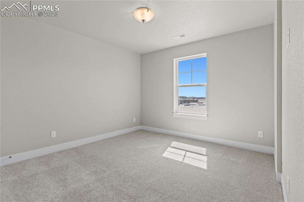 2154 Coyote Mint Drive Monument, CO 80132 - Photo 31 of 46 an empty room with a window