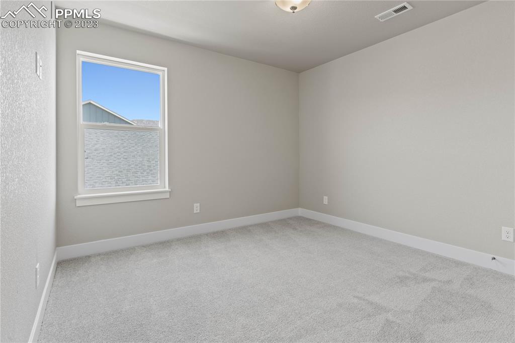 2154 Coyote Mint Drive Monument, CO 80132 - Photo 34 of 46 a view of an empty room with a window