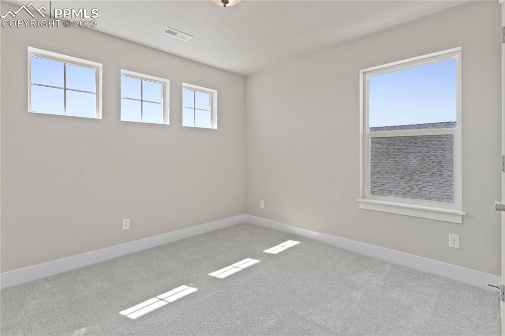 2154 Coyote Mint Drive Monument, CO 80132 - Photo 35 of 46 an empty room with windows