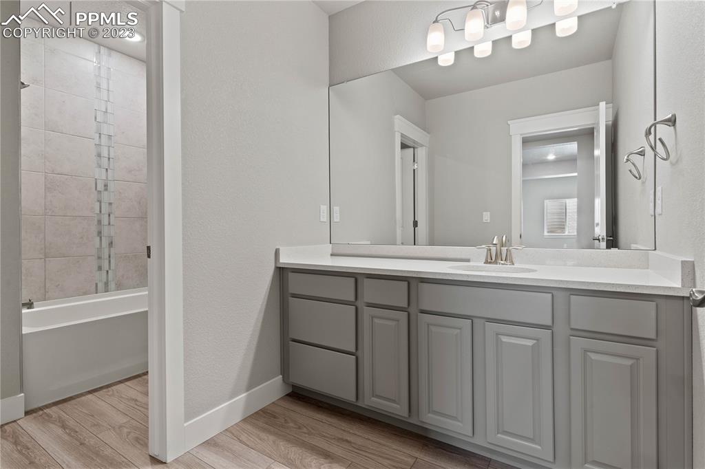 2154 Coyote Mint Drive Monument, CO 80132 - Photo 40 of 46 a bathroom with a double vanity sink and a mirror