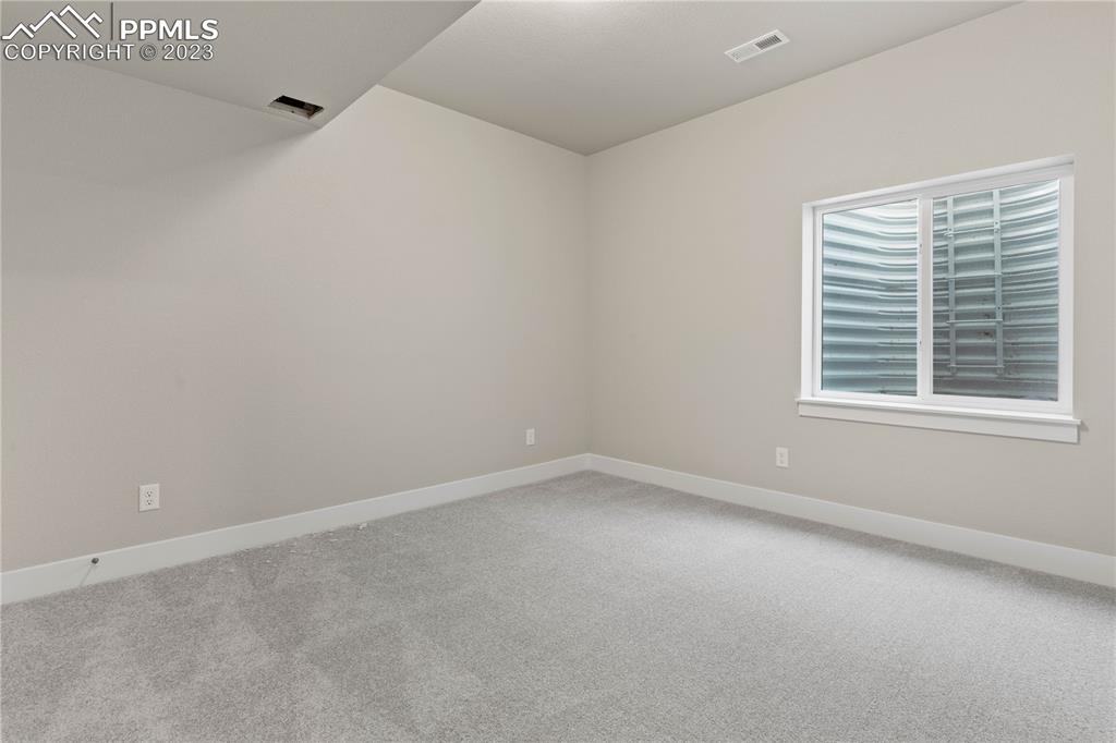 2154 Coyote Mint Drive Monument, CO 80132 - Photo 42 of 46 a view of an empty room with a window