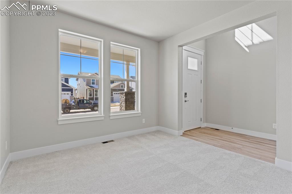 2154 Coyote Mint Drive Monument, CO 80132 - Photo 6 of 46 an empty room with windows