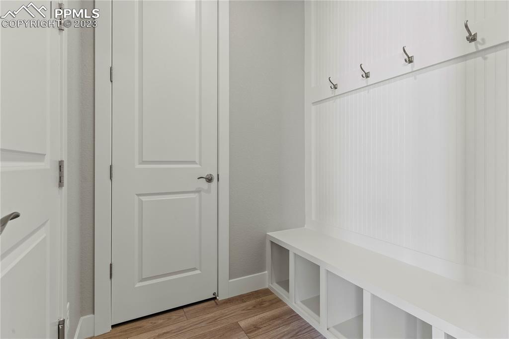 2154 Coyote Mint Drive Monument, CO 80132 - Photo 7 of 46 a hallway with white cabinets
