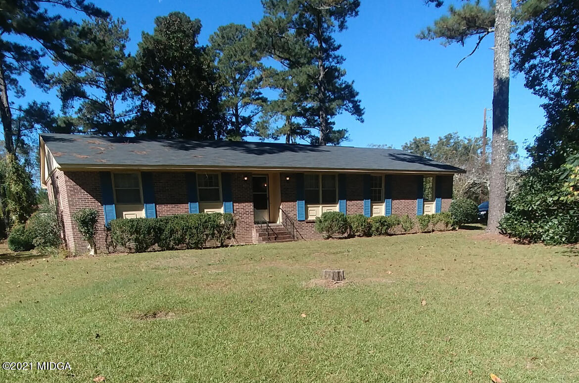 7325 Nowell Road South Macon, GA 31216 - Photo 1 of 18 front view of a house with a yard