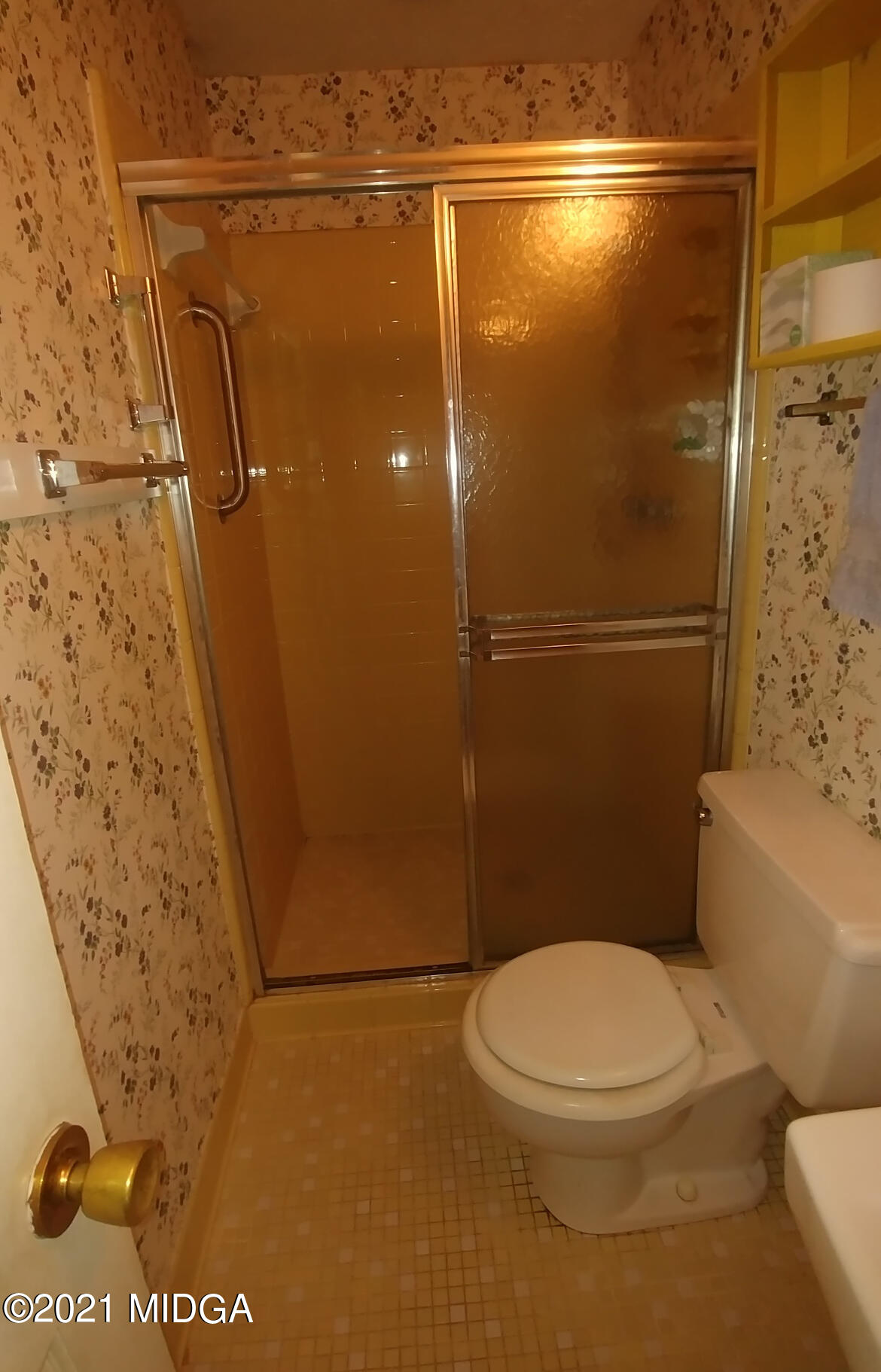 7325 Nowell Road South Macon, GA 31216 - Photo 11 of 18 a bathroom with a toilet and shower