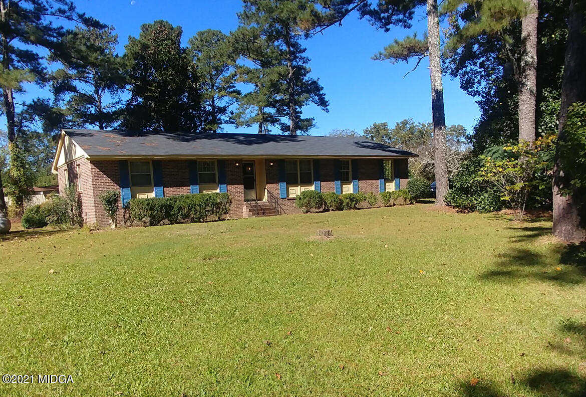 7325 Nowell Road South Macon, GA 31216 - Photo 13 of 18 a view of a house with backyard and garden