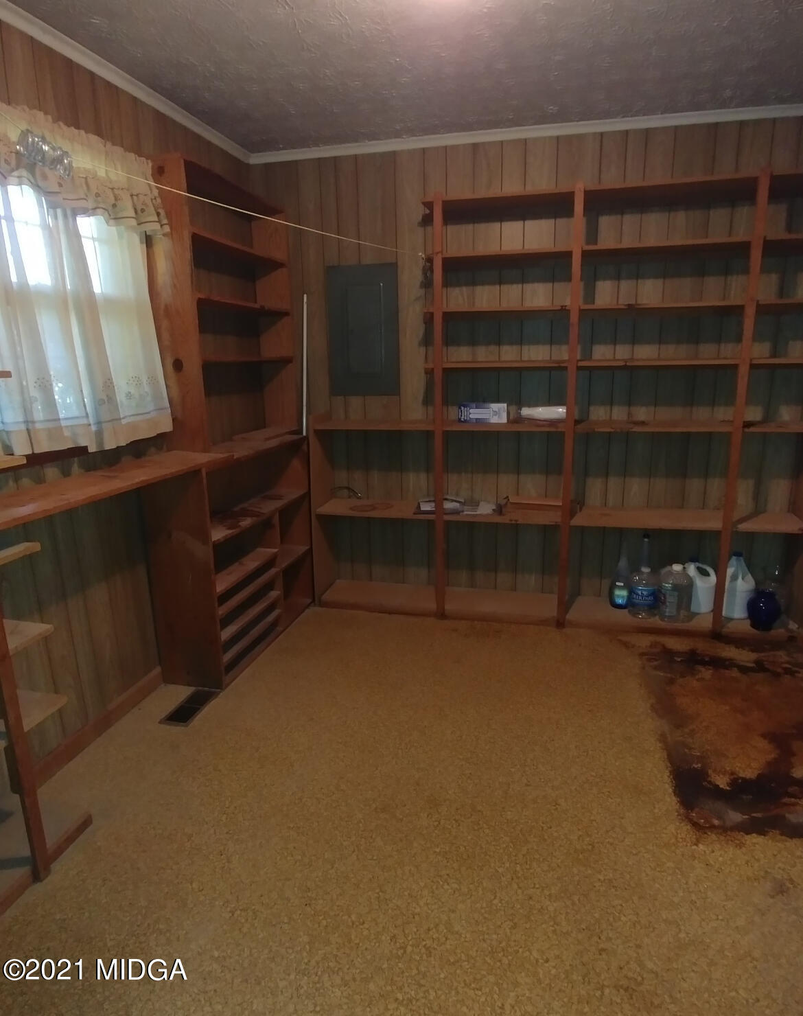 7325 Nowell Road South Macon, GA 31216 - Photo 5 of 18 a view of walk in closet with clothes and shoes