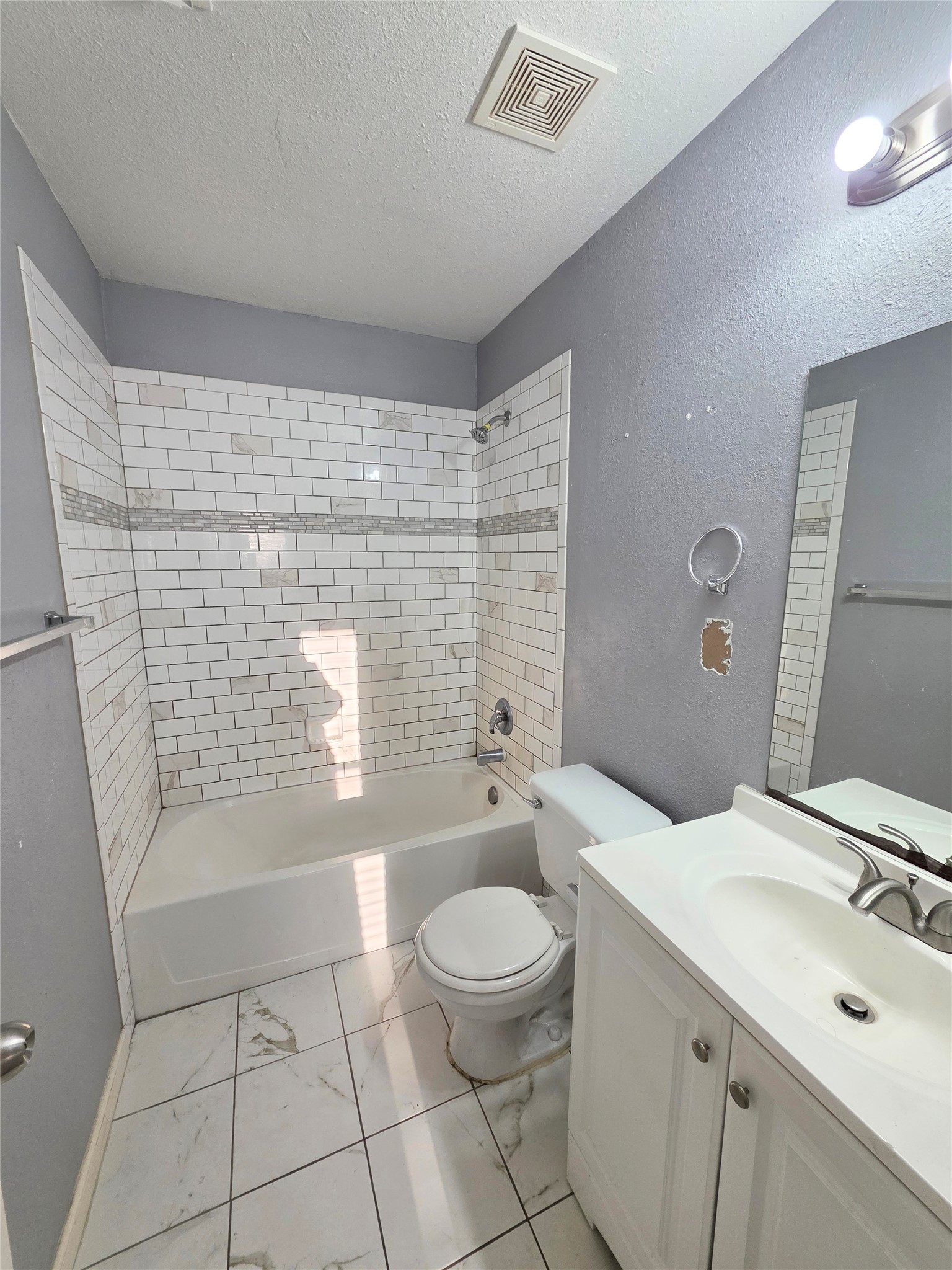 9514 Manorstone Court Houston, TX 77044 - Photo 7 of 9 a bathroom with a sink a toilet and shower