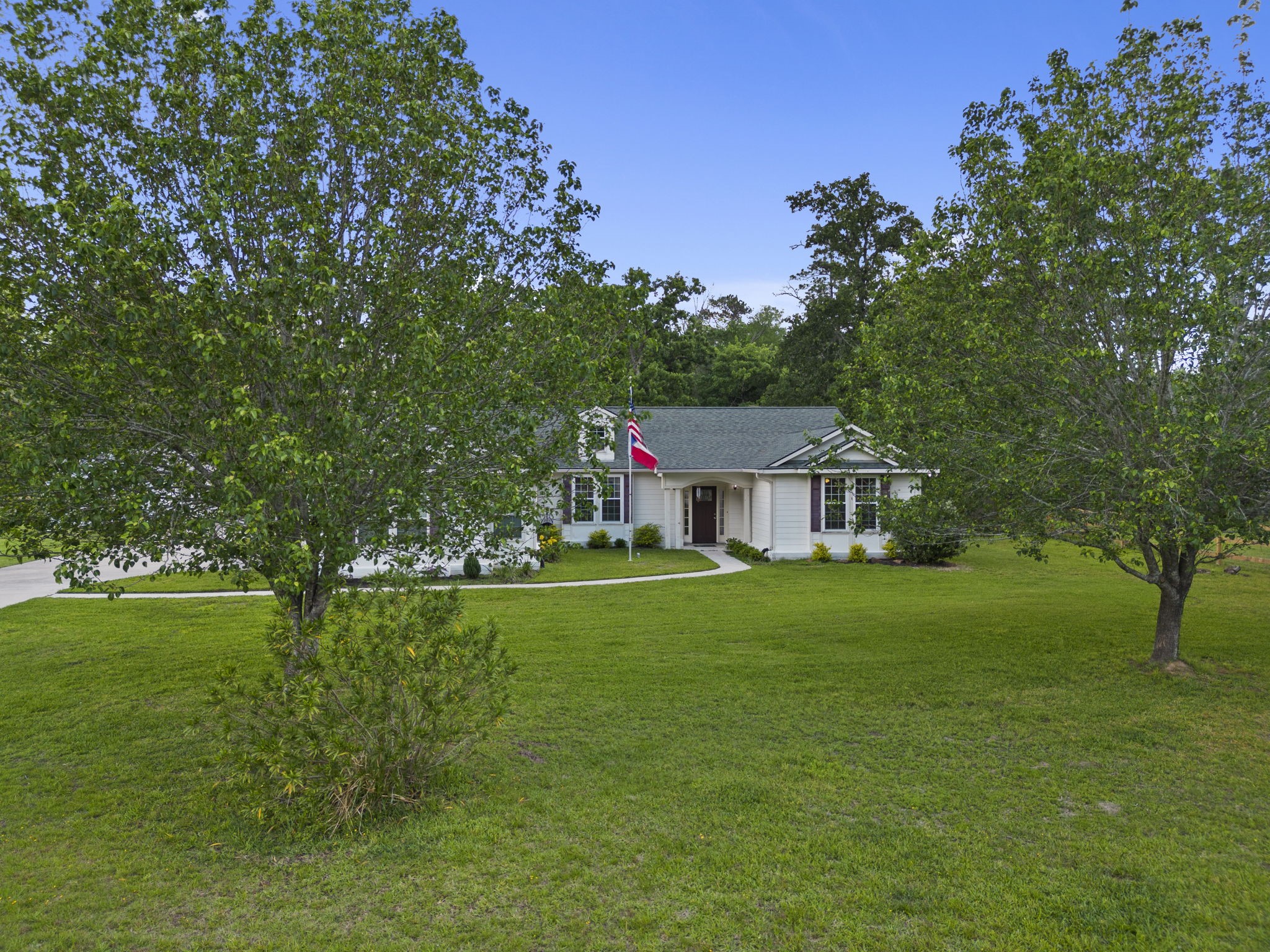 23200 Baneberry Road Magnolia, TX 77355 - Photo 37 of 39 a view of a house with a big yard