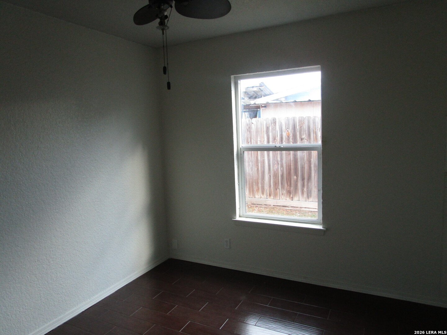 7106 Timber Ridge Drive San Antonio, TX 78227 - Photo 5 of 13 a view of an empty room with a window