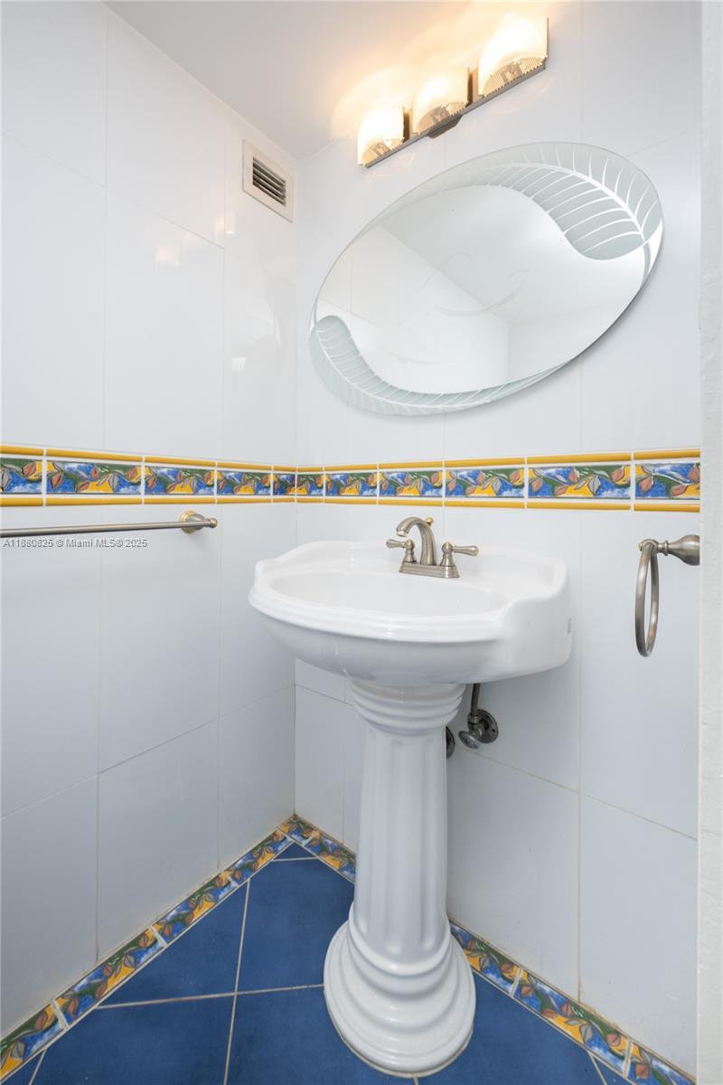 2030 South Ocean Drive, Unit 227 Hallandale Beach, FL 33009 - Photo 34 of 60 GUEST BATHROOM