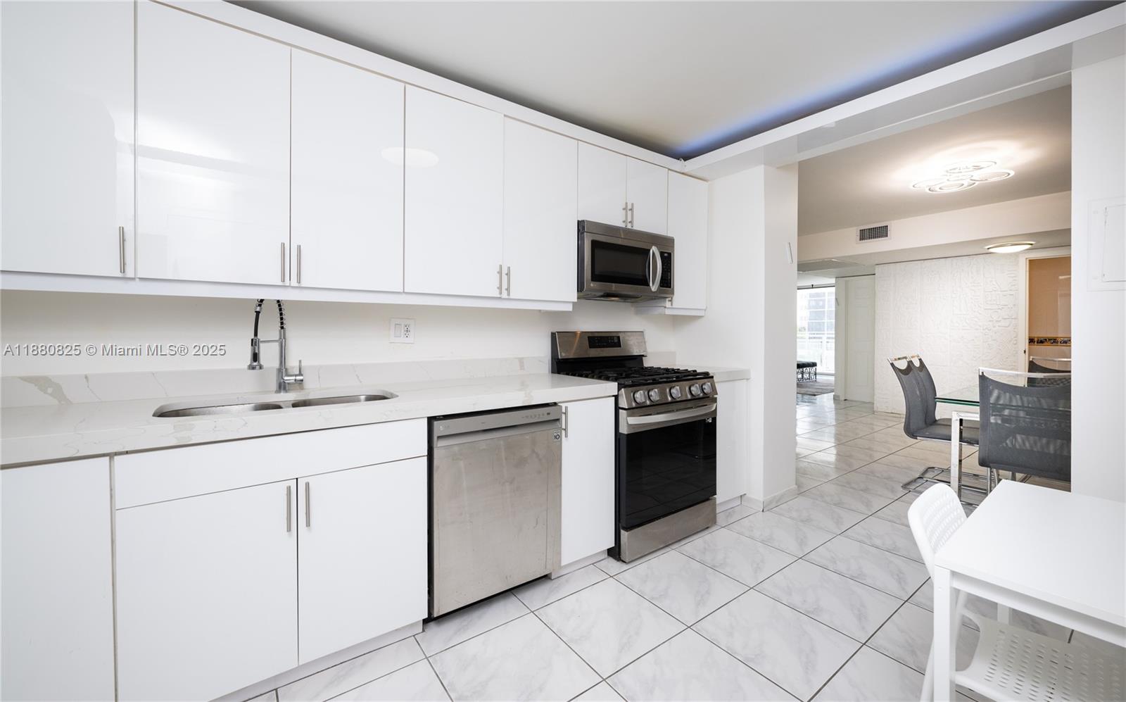 2030 South Ocean Drive, Unit 227 Hallandale Beach, FL 33009 - Photo 8 of 60 MODERN KITCHEN /W SS APPLIENCES