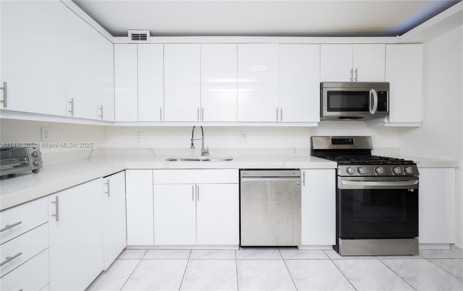 2030 South Ocean Drive, Unit 227 Hallandale Beach, FL 33009 - Photo 9 of 60 MODERN KITCHEN /W SS APPLIENCES