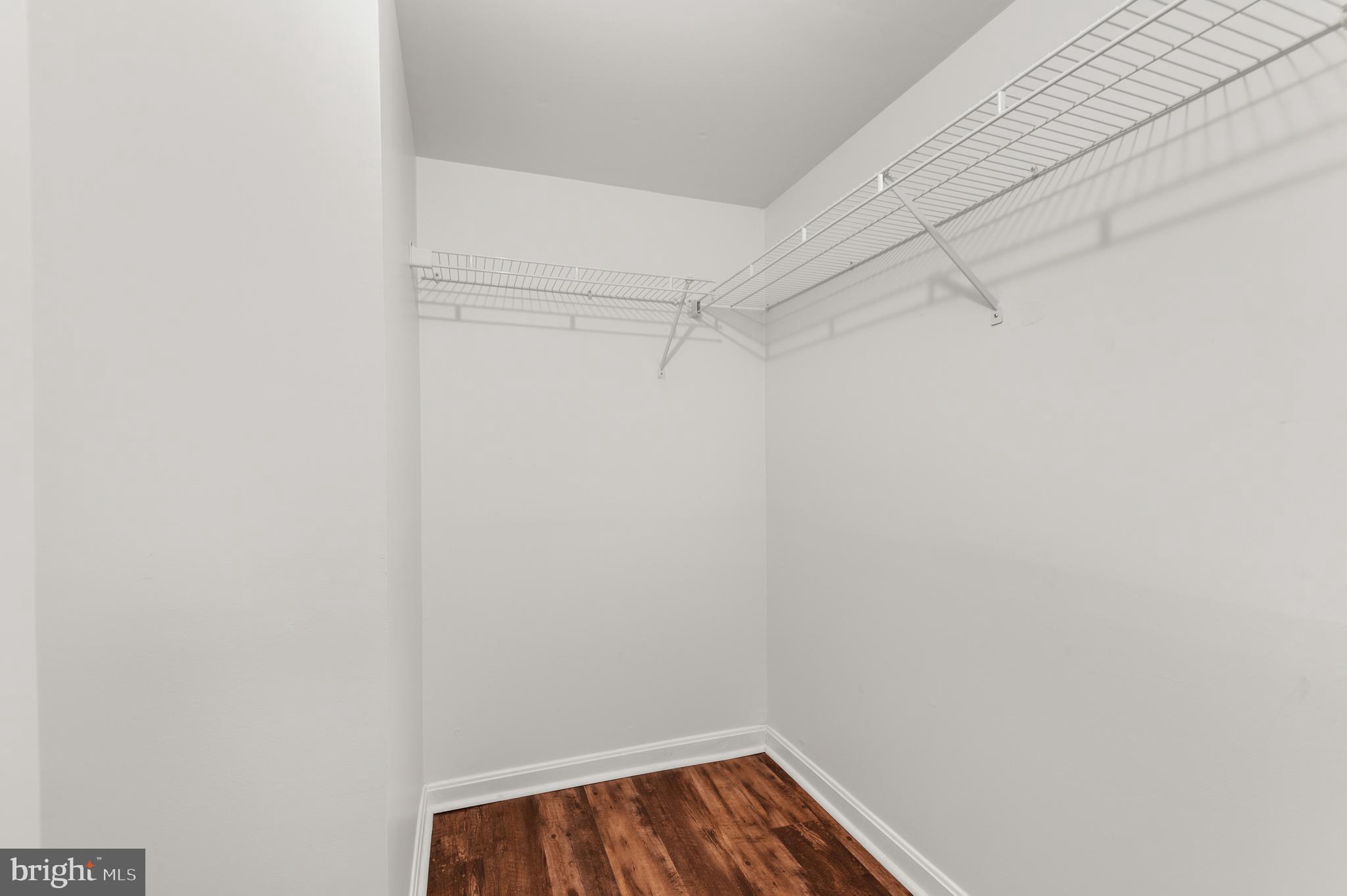 4942 Columbia Road, Unit 5 37 Columbia, MD 21044 - Photo 20 of 36 a view of a room with wooden floor