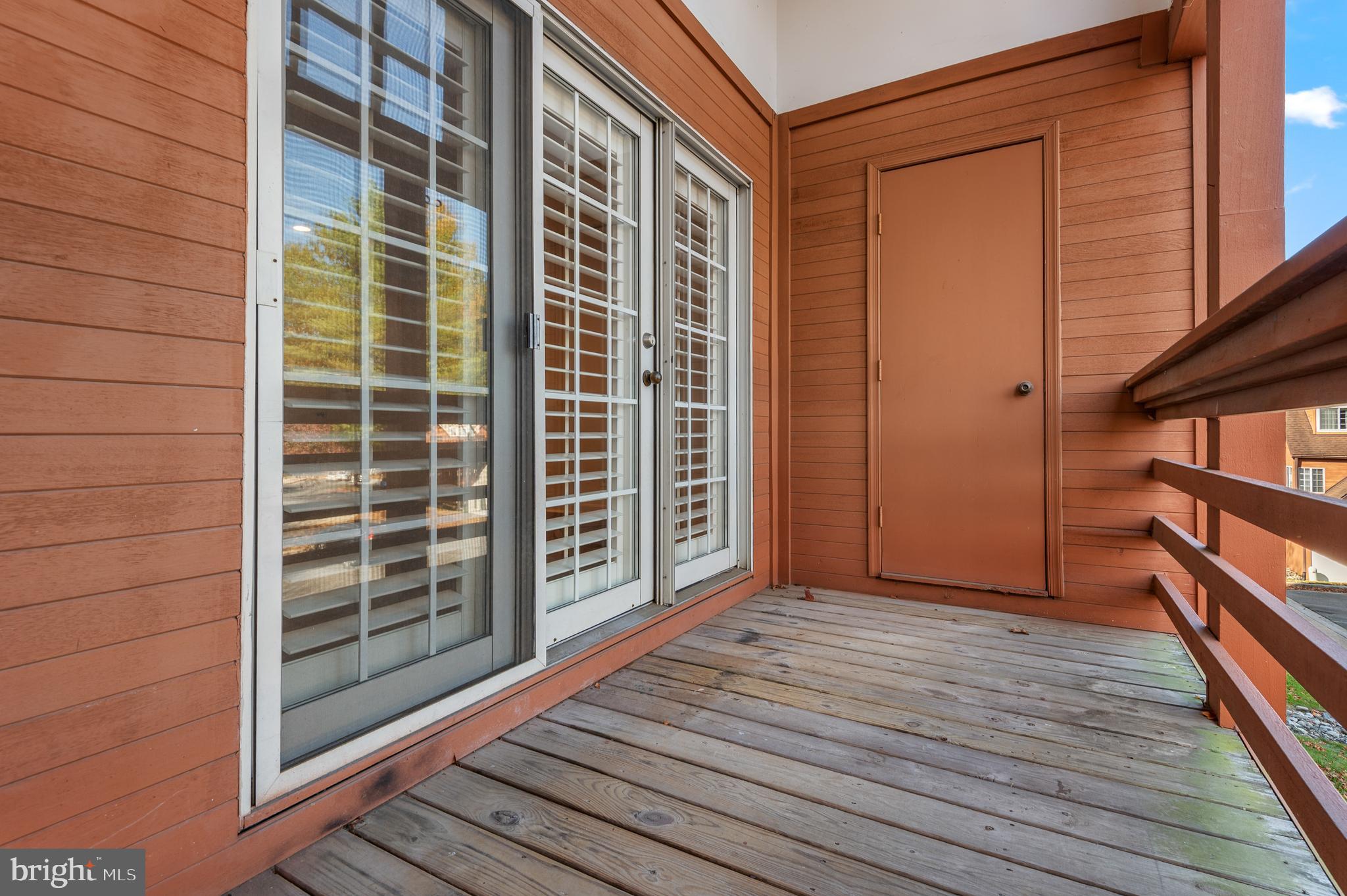 4942 Columbia Road, Unit 5 37 Columbia, MD 21044 - Photo 30 of 36 a view of outdoor space and wooden deck