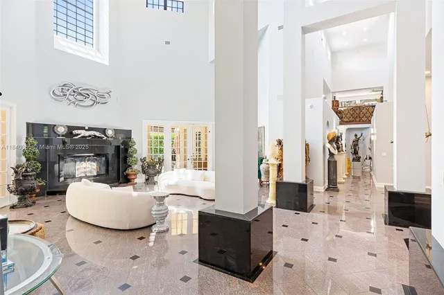 a living room with furniture and a table