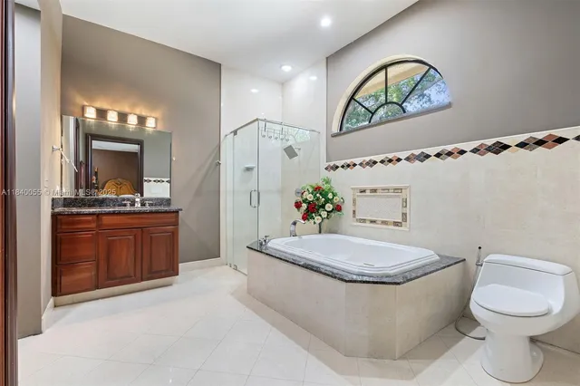 a view of backyard of house with yard and outdoor seating