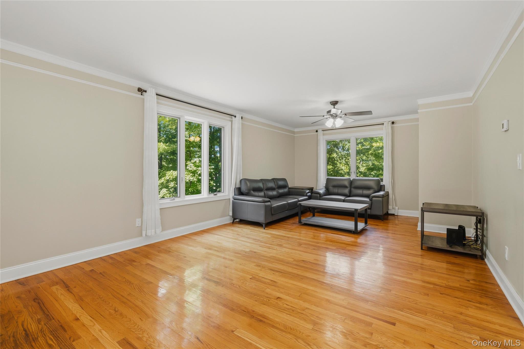 44 Sayer Road Blooming Grove, NY 10914 - Photo 20 of 39 a living room with furniture and a wooden floor