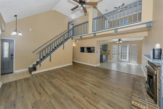 a kitchen with stainless steel appliances granite countertop a stove and a microwave