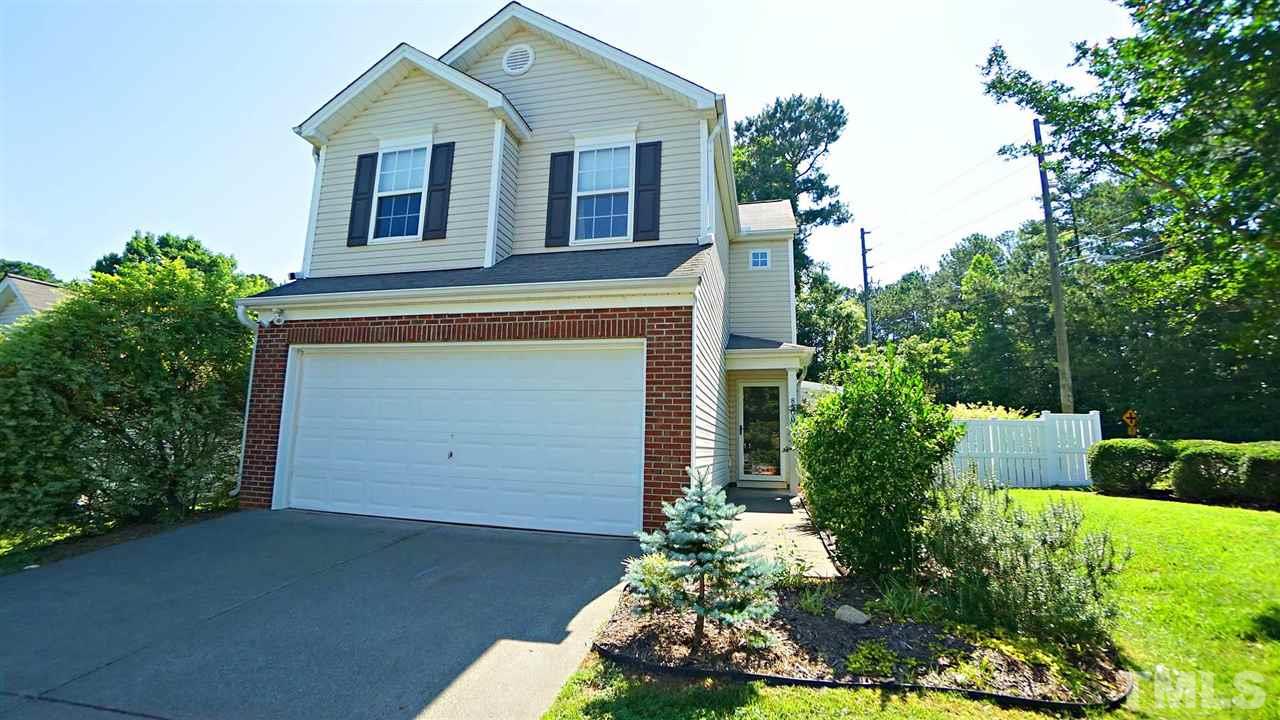 8900 Shallcross Way Raleigh, NC 27617 - Photo 2 of 22 front view of a house with a yard